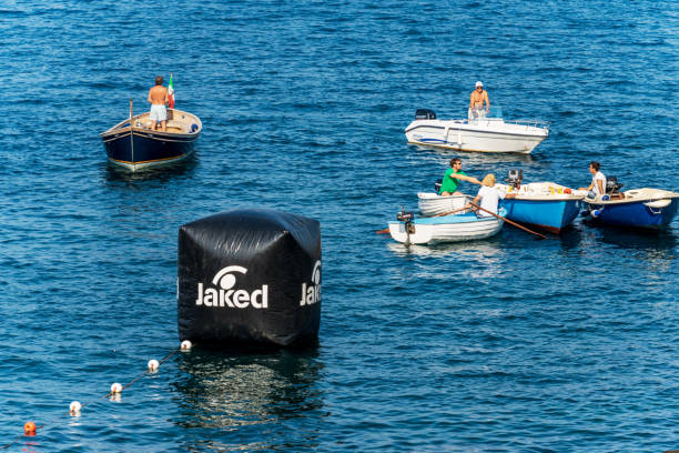recreational small boats in the mediterranean sea - liguria italy - rowboat nautical vessel small motorboat imagens e fotografias de stock
