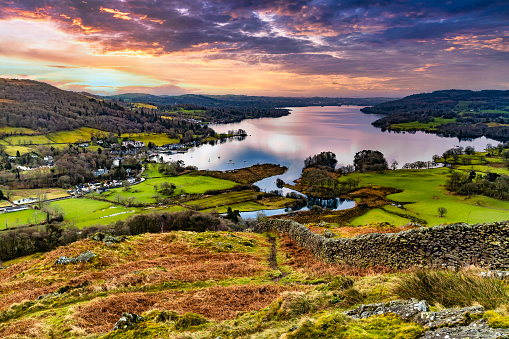 Windermere is a large lake in Cumbria’s Lake District National Park, northwest England. It’s surrounded by mountain peaks and villages.