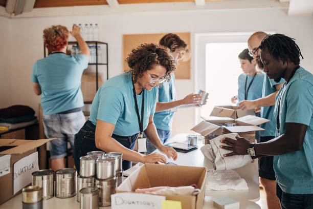 istock Volunteers in charity center 1423377534