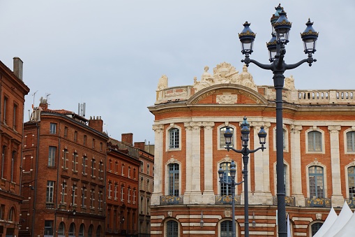 Historic City Hall (Hotel de Ville) in downtown Toulouse city, France. Place du Capitole city square.
