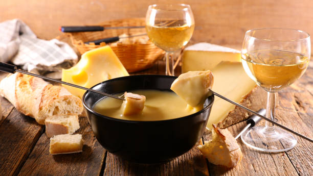 istock cheese fondue with bread and wine 1423377621