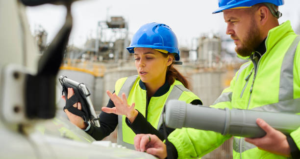 site engineers at petrochemical plant stock photo