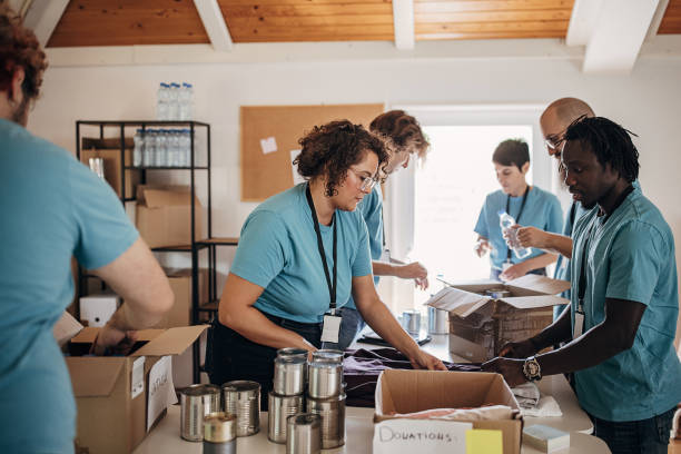 istock Volunteers in charity center 1423377766