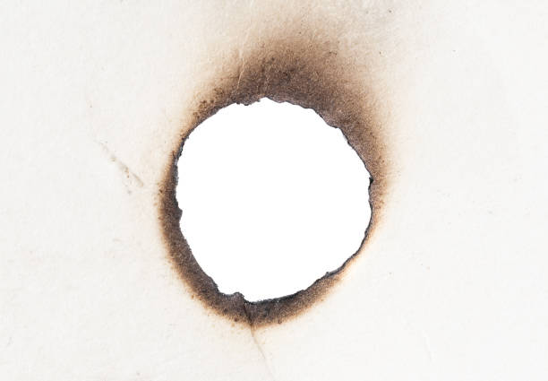 white burnt paper on white isolated background white burnt paper on white isolated background at the edge of burnt frame grunge stock pictures, royalty-free photos & images