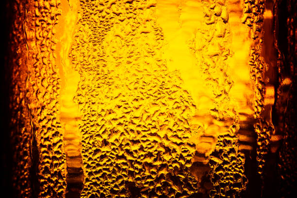 istock macro beer bottle background,Beer background ,Water drops background 1423382405