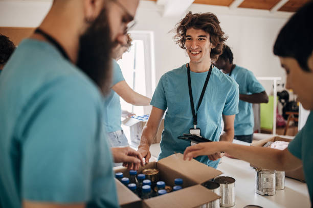 istock People sorting donations for the homeless 1423383773