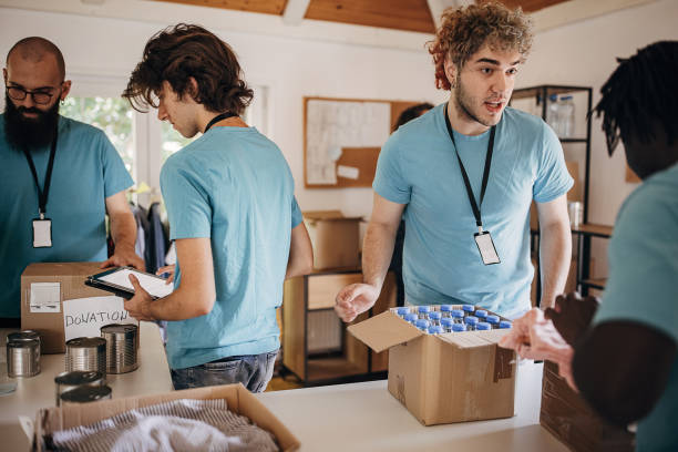 istock Volunteers sorting donations for the homeless 1423384353