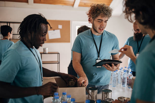 istock Volunteers sorting donations for the homeless 1423384392