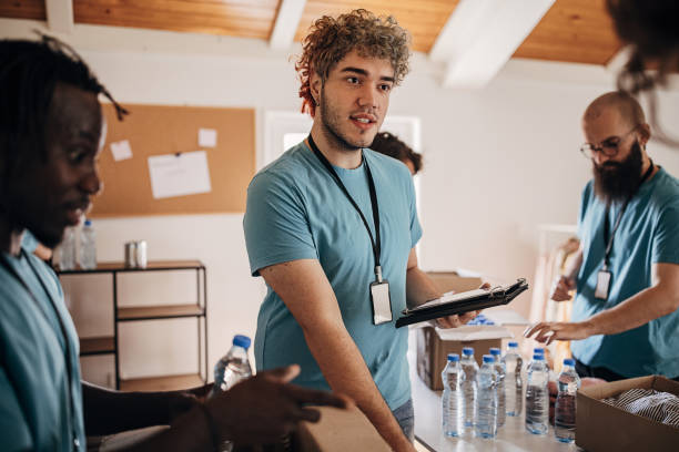 istock Volunteers sorting donations for the homeless 1423384503