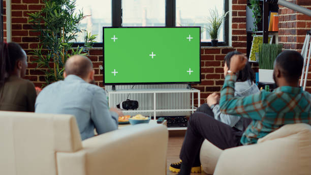 istock People cheering at football game match on greenscreen 1423385279
