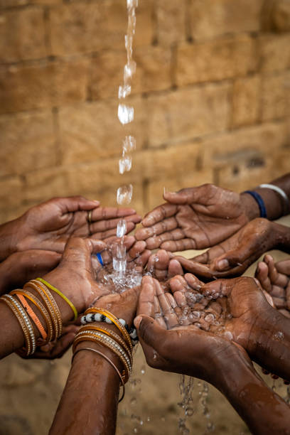 istock Poor Indian children asking for fresh water, India 1423385514