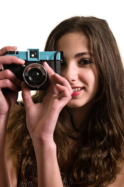 istock Teenage girl with plastic camera 142338944