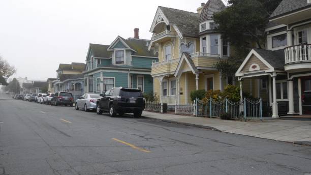 Old victorian style houses, historic Monterey, California. Colonial architecture Row of old victorian style houses, historic residential district, Monterey, California USA. Colonial architecture, retro vintage suburban wooden classical cottages. Real estate property, city street. city of monterey california stock pictures, royalty-free photos & images