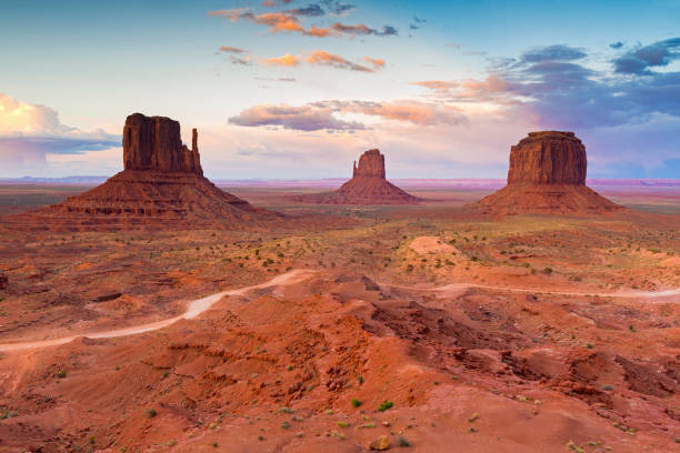 Monument Valley National Park, Utah, USA Wide angle panoramic view of Monument Valley at the Utah Arizona border, USA, North America. butte rocky outcrop stock pictures, royalty-free photos & images