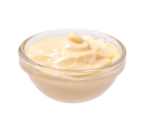istock Mayonnaise sauce in bowl isolated on white background 1423400424