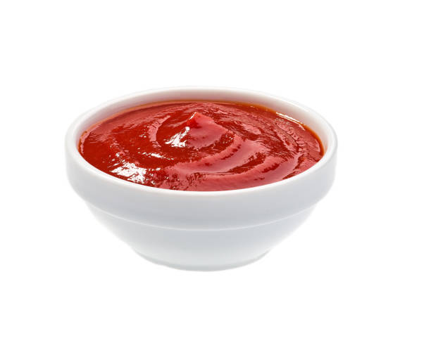 istock Tomato sauce,Ketchup in ceramic bowl isolated on white backgroun 1423400436
