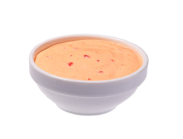istock Paprika sauce in ceramic bowl isolated on white backgroun 1423400630
