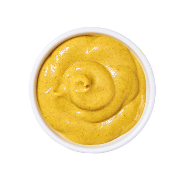istock Mustard sauce in ceramic bowl isolated on white background. Top 1423400706