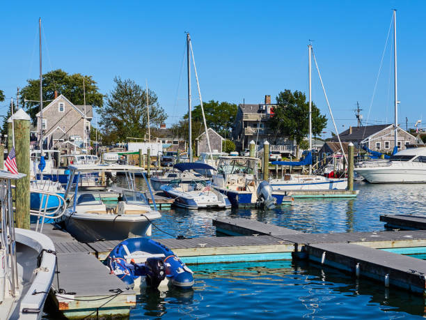 Falmouth harbour on Nantucket Sound.  There are a vast array of yachts and motorboats moored in the marina.