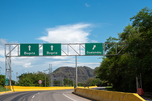 Highway signs pointing the direction to the city of Bogota. Colombia.