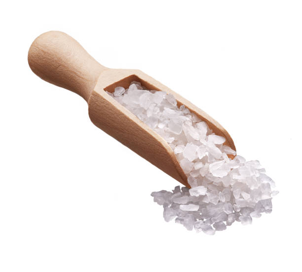 istock salt on wooden spoon isolated . 1423405835
