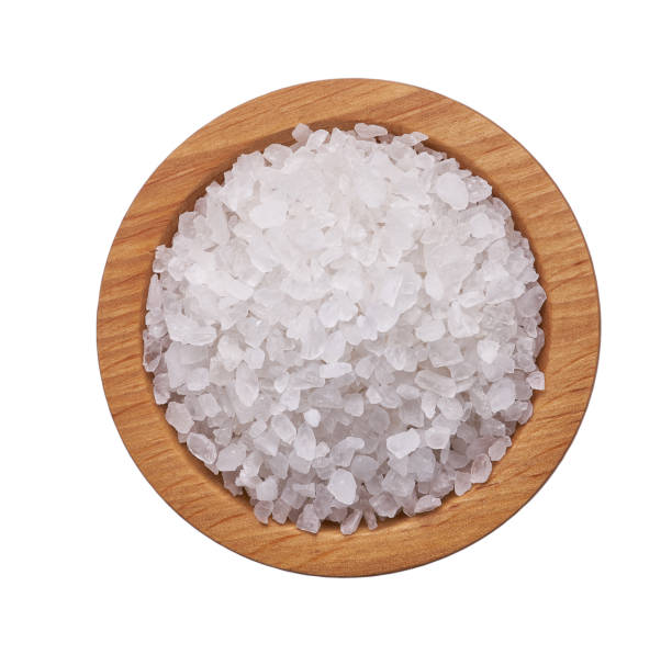 istock white salt crystals in a wooden bowl isolated 1423405839