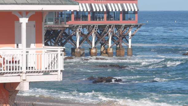 istock Waterfront beachfront cafe on piles or pillars, Monterey beach, California coast 1423407025