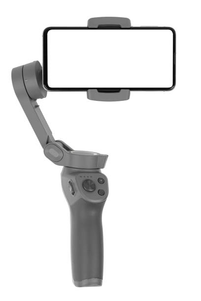 istock Stabilizer for a smartphone on a white background. Gimbal and smartphone with white screen isolated on white background. 1423411585