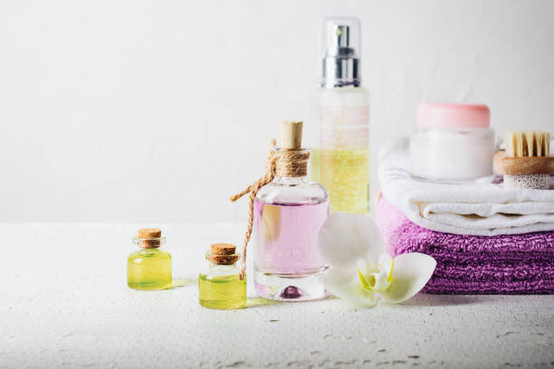 istock Essential oils, perfumed water in glass bottles. 1423411797
