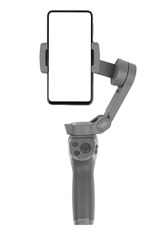 Stabilizer for a smartphone on a white background. Gimbal and smartphone with white screen isolated on white background.