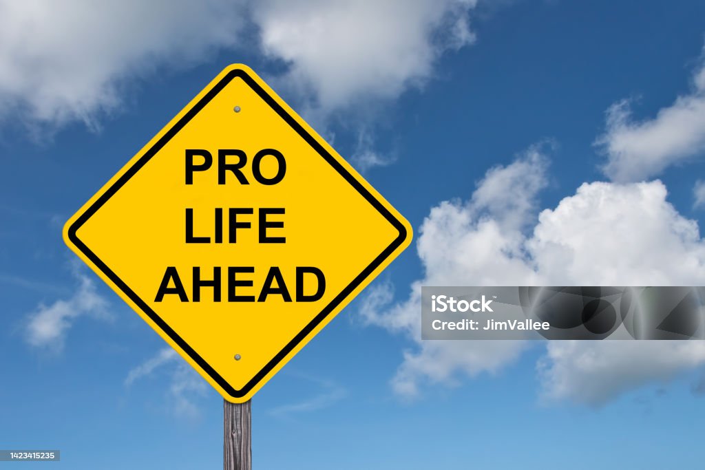 Pro Life Ahead Warning Sign Pro Life Ahead Caution Sign Blue Sky Background Abortion Stock Photo