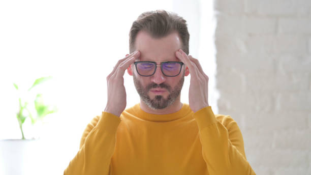 istock Portrait of Man having Headache, Stress 1423415447