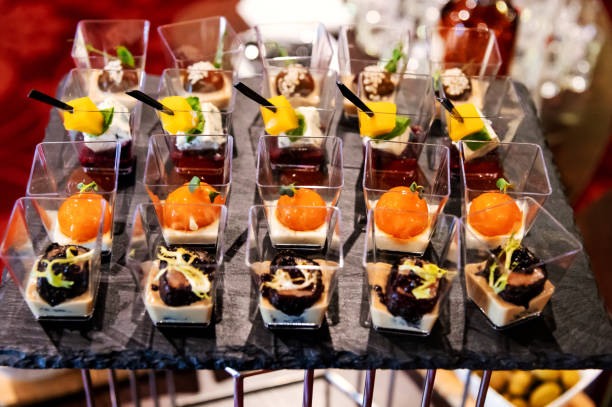 istock Canape appetizers with grape and DorBlu cheese. DorBlu Cheese with grape on skewers. Canapes for the holiday. 1423416167
