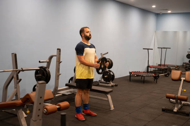 istock Real men's bodies in the gym 1423424291