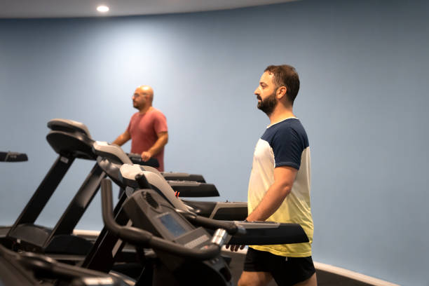 istock Real men's bodies train in the gym 1423424298