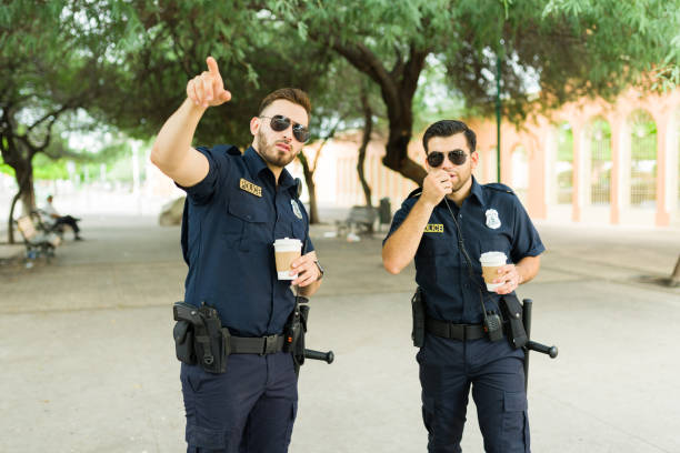 istock Busy police officers reporting a crime 1423424703