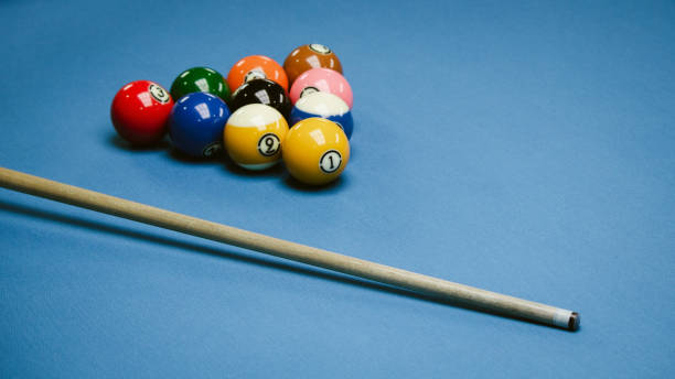 istock Background image of Billiard balls in a blue pool table. 1423427694