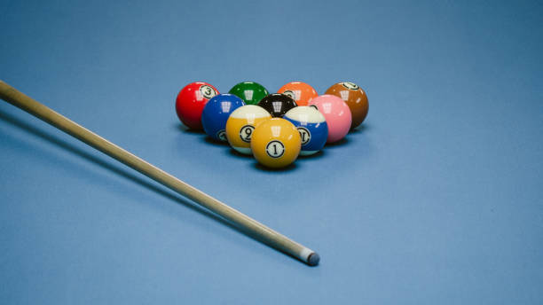 istock Background image of Billiard balls in a blue pool table. 1423427928