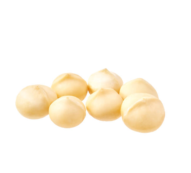 istock Peeled  macadamia nut isolated on white background 1423428374