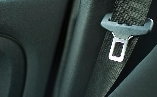Close up seat belt in modern car.