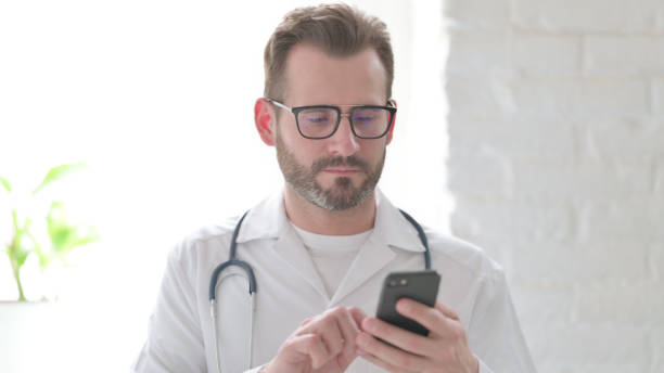 istock Portrait of Doctor using Smartphone 1423433584