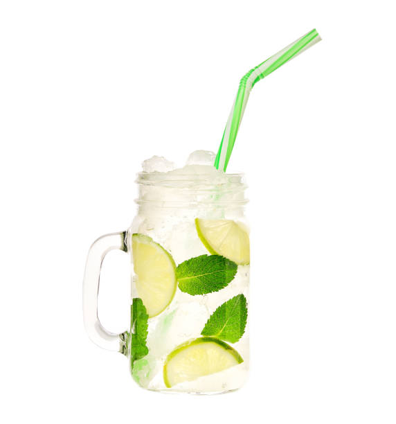 istock mojito cocktail isolated in jar on white background. 1423433844
