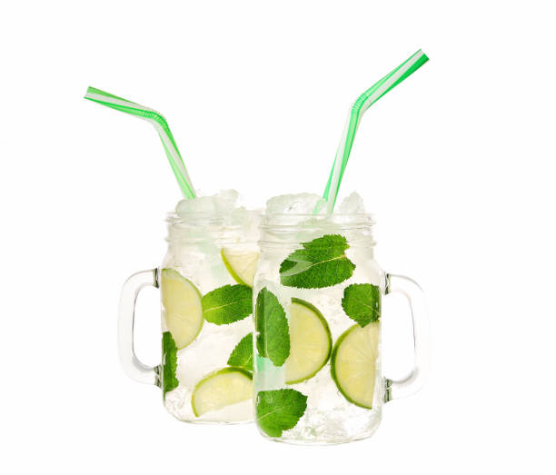 istock mojito cocktail isolated in jar on white background. 1423433850