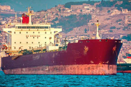 View of a merchant vessel anchored in gulf of Izmir.