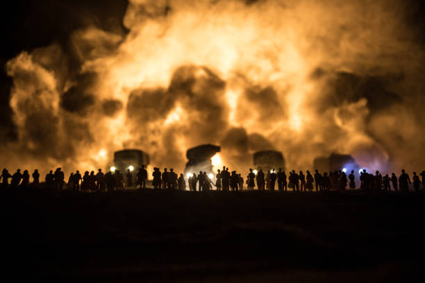 istock Creative artwork decoration war on Ukraine. Crowd looking on giant explosion and attacking soldiers. 1423439334