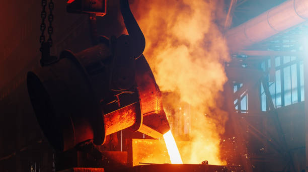 Process of Casting in Foundry. Steel Mill metallurgical Factory. Molten metal. Heavy Industry stock photo