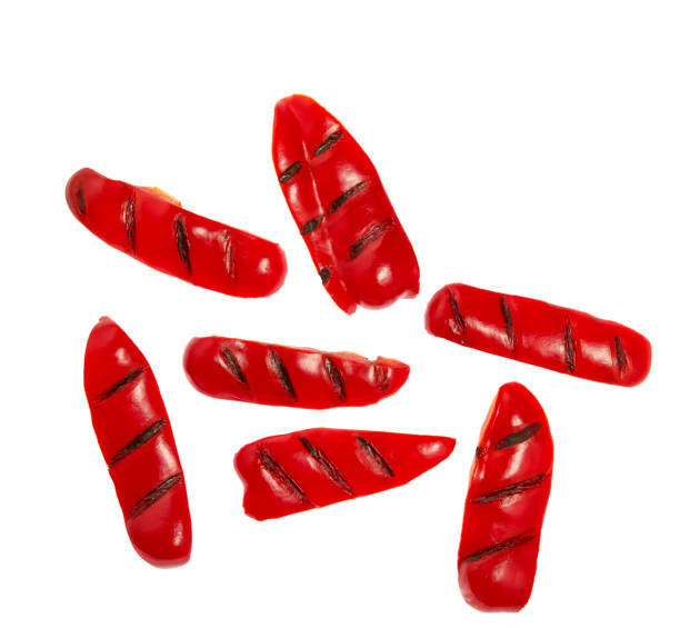 grilled sliced red bell pepper isolated on white background. Top view.