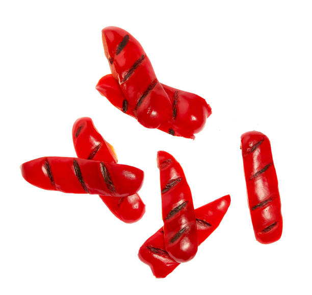istock grilled sliced red bell pepper isolated on white background. Top view. 1423448935