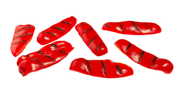 istock grilled sliced red bell pepper isolated on white background. 1423448948