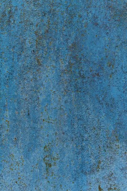 istock Rusty painted metal surface on wall background. Pattern of rustic blue grunge material. Vertical arrangement. 1423450201